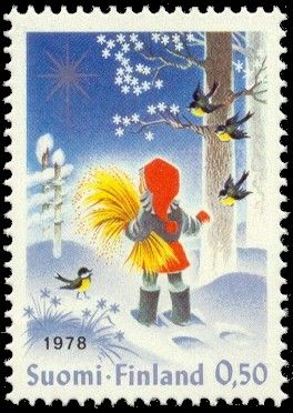 Christmas, Girl feeds Great Tit (Parus major)