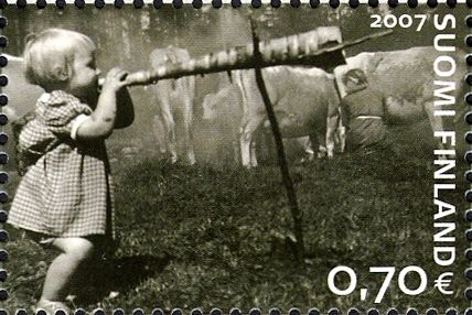 Herding girl blowing birch bark horn