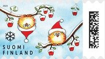 Santa-Capped Owls in Tree