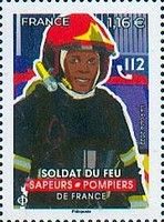 Firefighter in Helmet with Torch