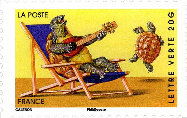 Turtle in a Beach Chair Playing Guitar