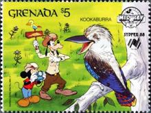 Mickey Mouse and Goofy photographing blue-winged kookaburra