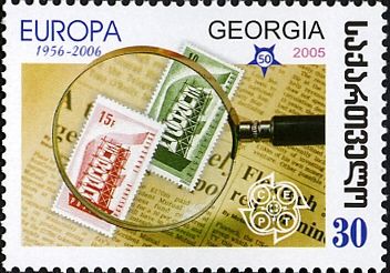 Magnifying Glass and First Europa Stamps