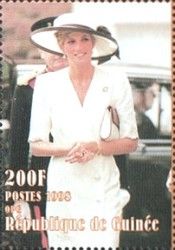 Diana in white dress, with broad brimmed hat