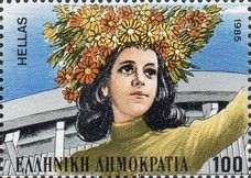Crowned girl in front of the "Peace and Friendship" Stadium