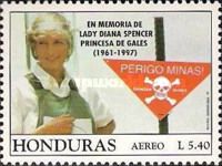 Diana dressed to walk through mine field, warning sign