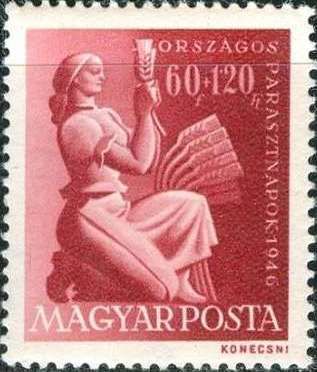 Woman with ear of wheat