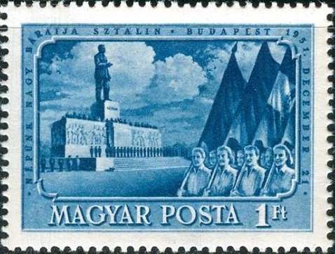 Marching past the Stalin monument