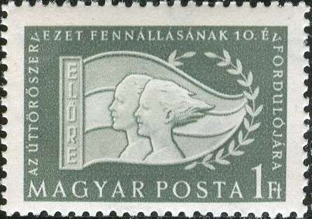 10th Ann.: boy and girl in front of flag