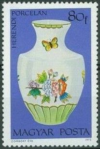 Vase with flowers and butterflies