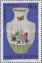 Vase with flowers and butterflies