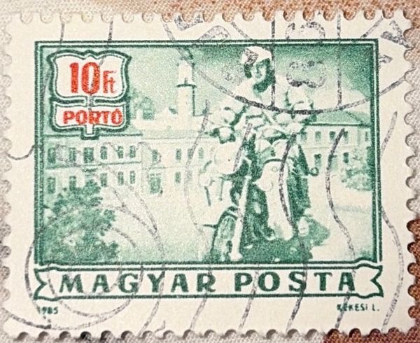 Postage due - Postman on motorcycle
