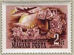 Aircraft, mail coach and stamps in front of globe