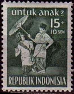 Menangkabu boy and girl performing Umbrella Dance