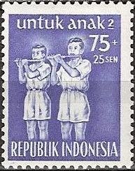 Ambonese boys playing flutes