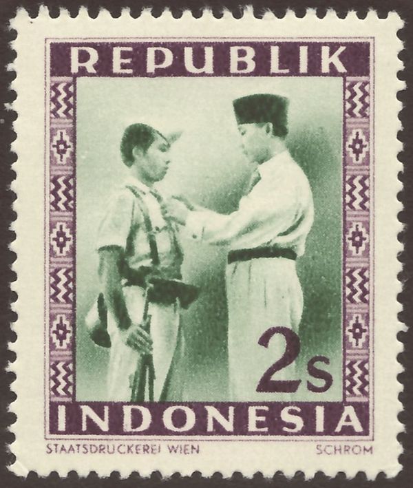 President Soekarno Decorates a Soldier overprinted
