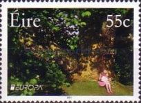 Small Girl Reading under a Tree