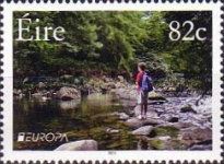 Boy at the Edge of a River