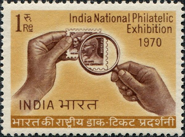 1r Ghandi Commemorative through Magnifier