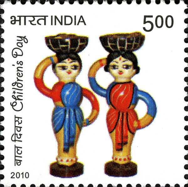 Two Dolls with Baskets on their Heads