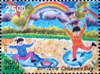 Girl and Boy Playing in Puddles and Rainbow