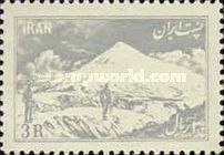 Climber in front of Mount Damāvand