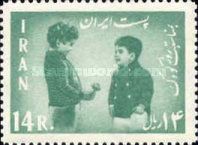 Boy presents some flowers to the Crown Prince Cyrus Reza