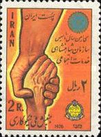 Young man holding Older Man's hand