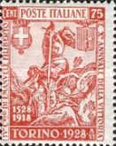 Emanuele Filiberto flanked by a soldier of war