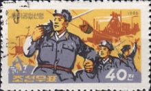 Miners in front of steelworks