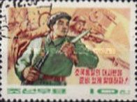 Soldier in front of metallurgical and agricultural workers