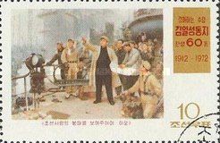 Kim Il Sung visiting factory & talking to foundry workers