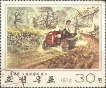 Farmer with tractor while plowing