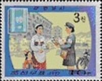 Postwoman delivering mail