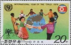 Children from Different Continents Dancing Around a Globe