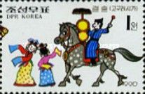 Man on horse beating drum.