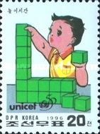 Boy Playing with Building Blocks