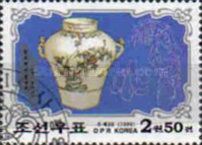 White china pot with blue flower