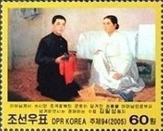 Kim Il Sung receives his father's weapons