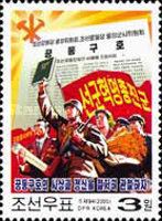 Soldier with book on the Juche idea, workers and peasants