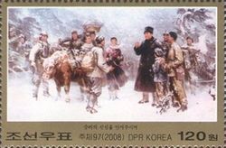 Kim Il Sung with villagers in a snowstorm