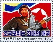 Soldier in front of national flag