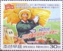 Farmer with sheaf of grain, food, vehicles