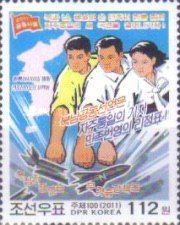 Three men smash nuclear weapon, map