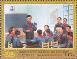 Group of students studying the biography of Kim Il Sung