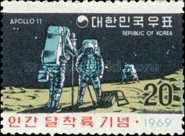 Astronauts gathering rock samples