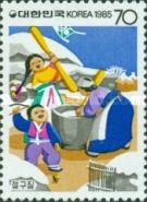 Folkways - pounding rice