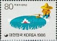 Boy fishing for stamp