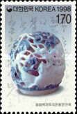 Blue and white procelain featuring a cloud and dragon decora