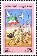 Soldiers carrying Kuwaiti flag